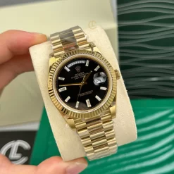 Đồng hồ Rolex Day-Date M228238-0004 40mm Black Dial Yellow Gold Replica 1:1 – Top Quality Version