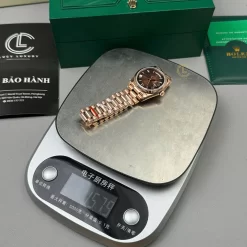 Đồng Hồ Rolex Day-Date 36mm 128235 Chocolate Dial Rose Gold Replica 1:1 – Top Quality Version